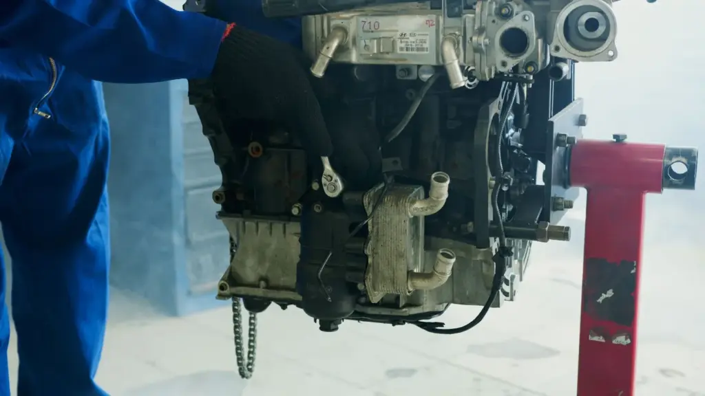 A car gearbox on a workshop stand